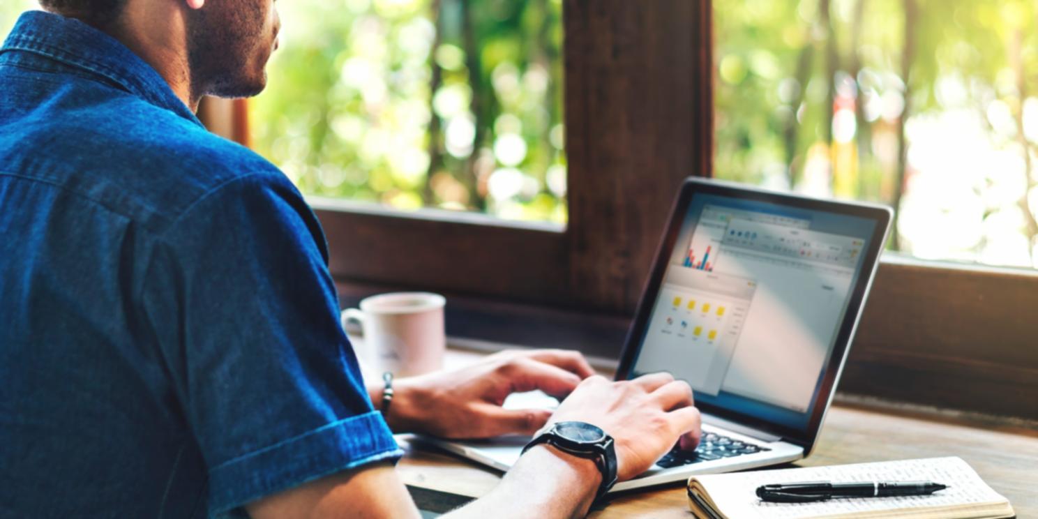 Student reviewing financial spreadsheets and planning tools during budgeting masterclass